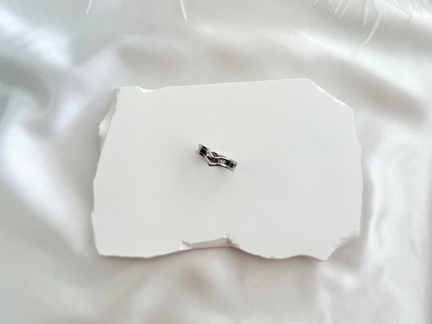 Curved ring