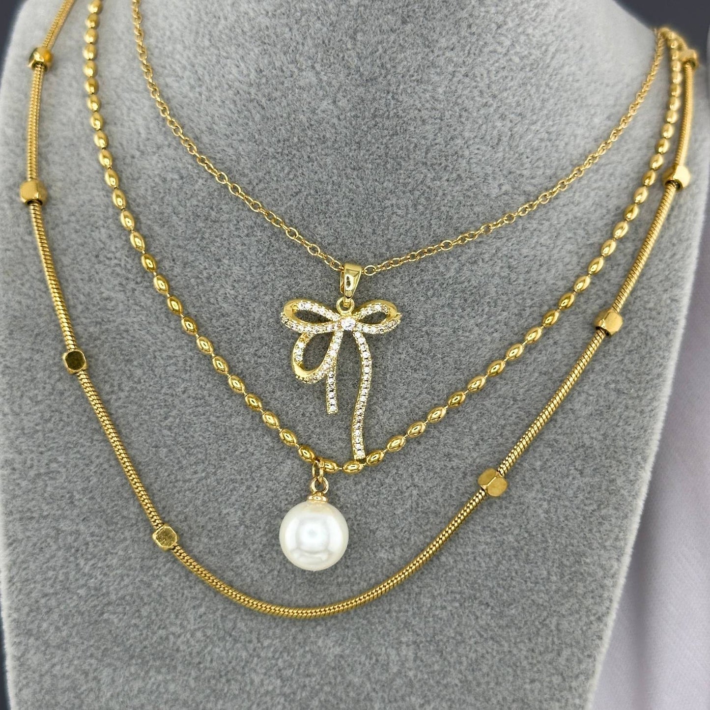Diamonte bow necklace