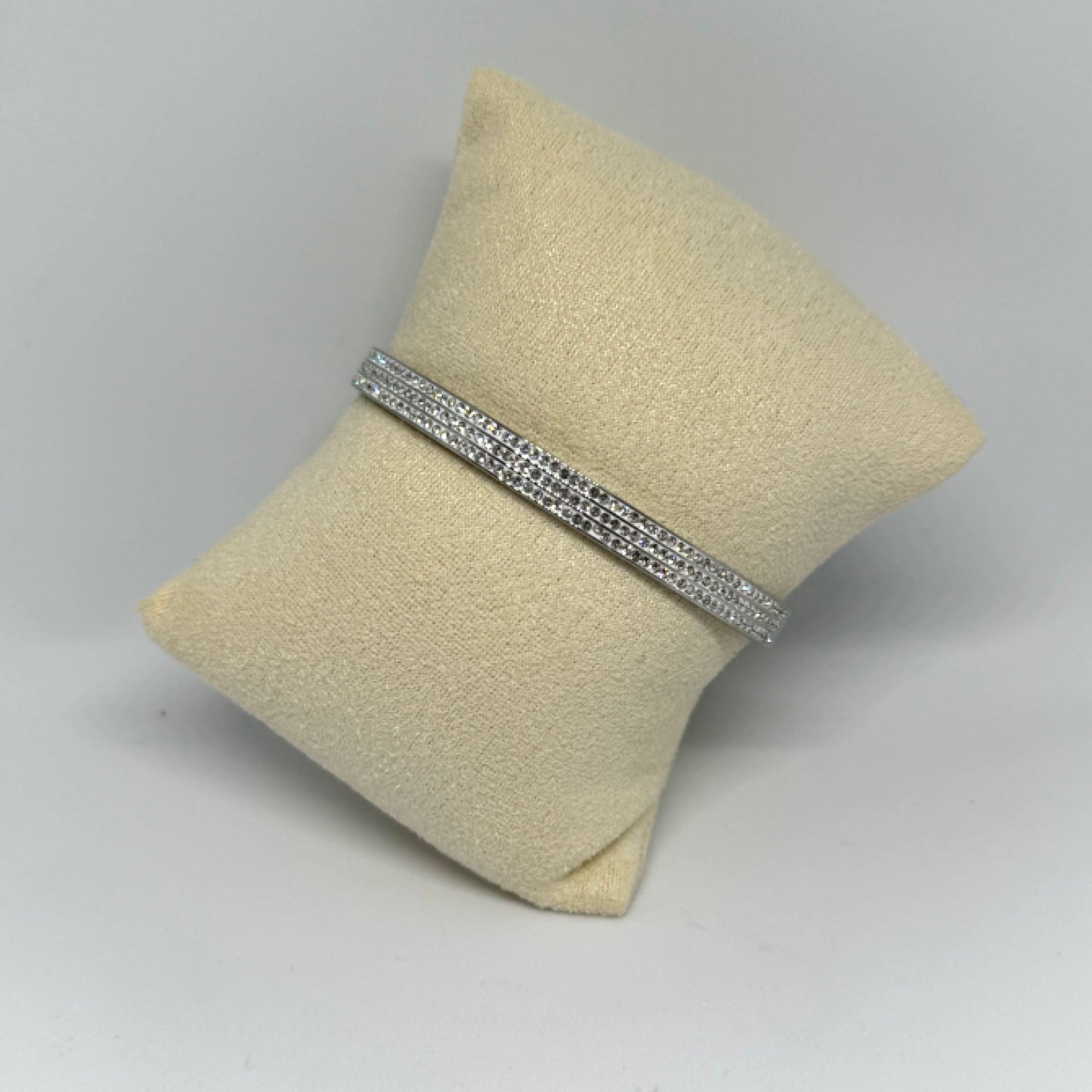 Triple row diamond covered bangle silver