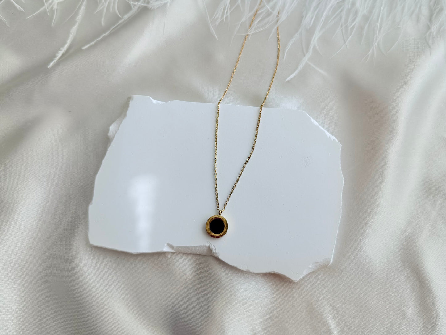 Roman numeral disc necklace