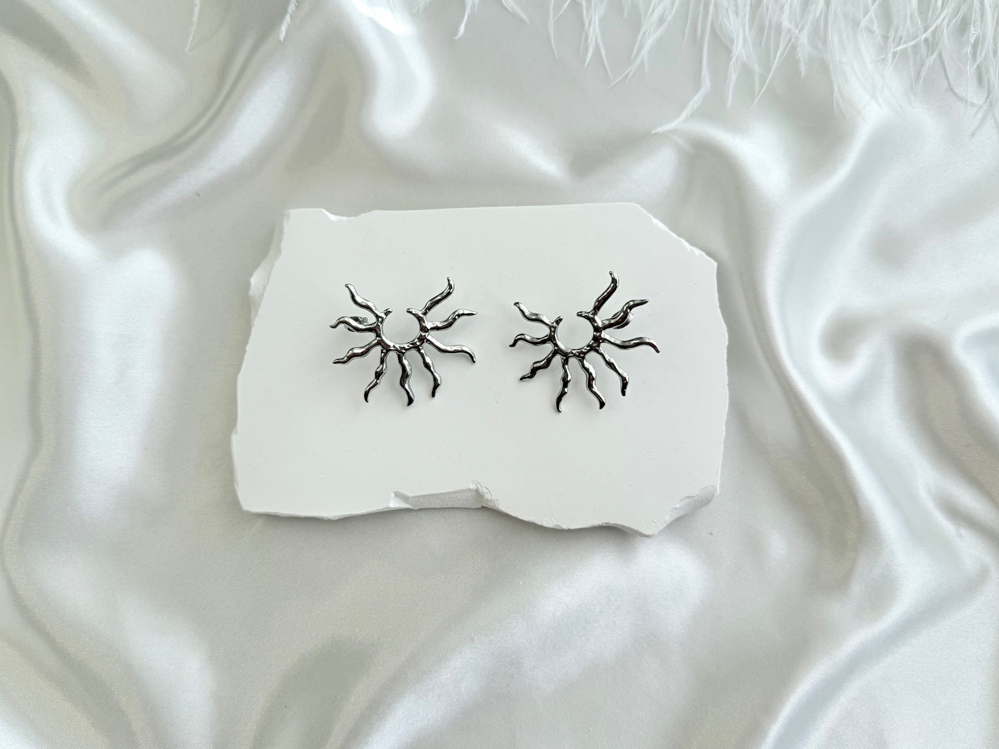 Sun statement stud earrings silver