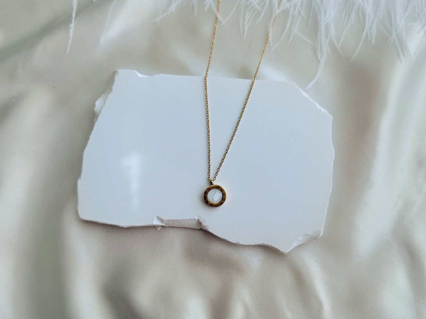 Roman numeral disc necklace
