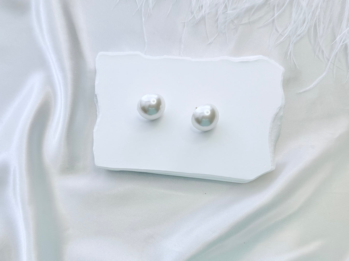 Half pearl large stud earrings