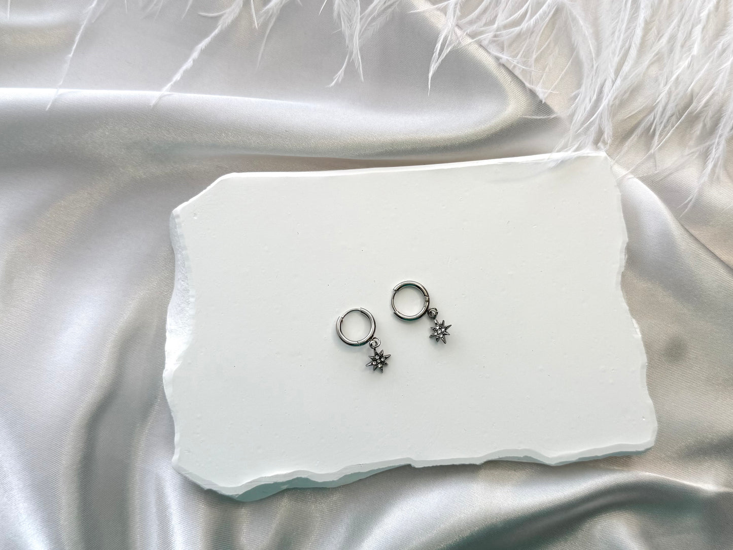 Lucky star diamonte drop earrings