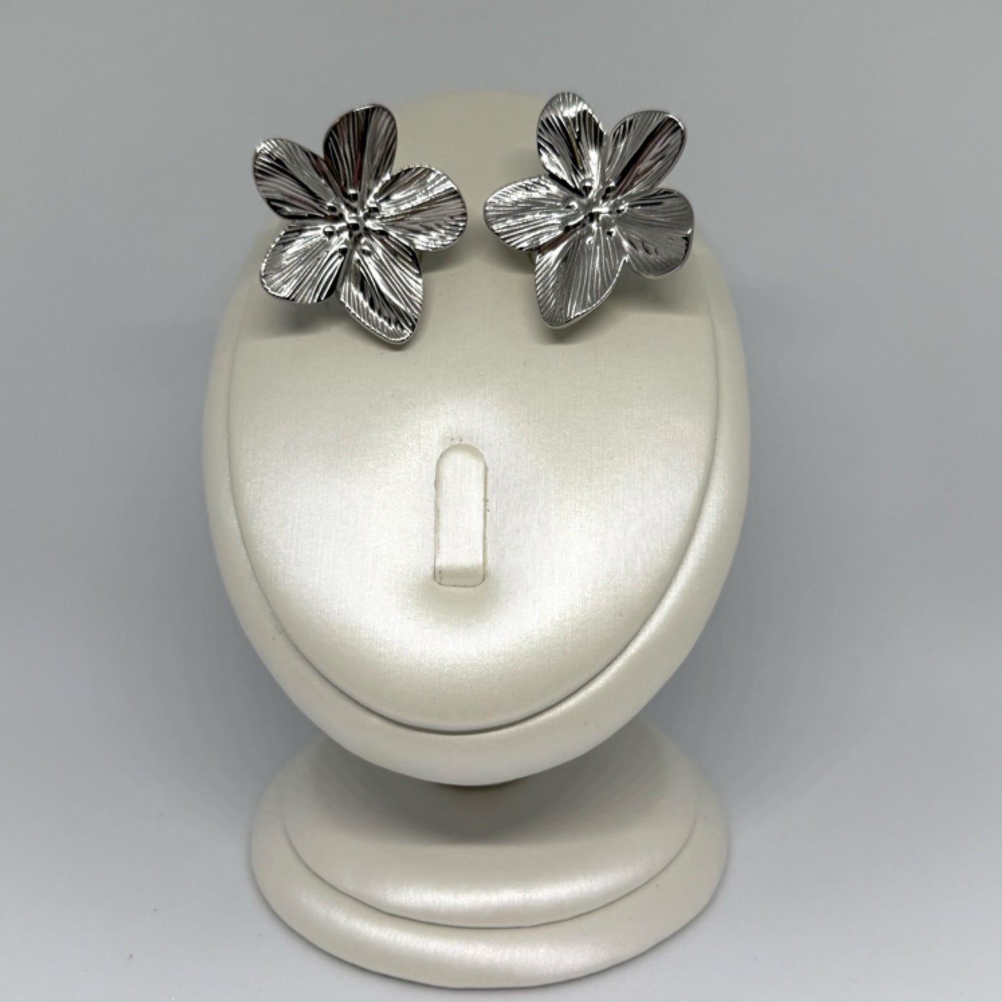 Hibiscus statement stud earrings silver