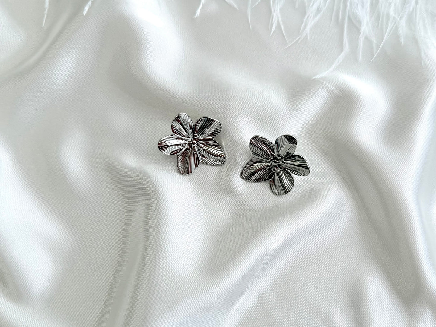 Hibiscus statement stud earrings silver