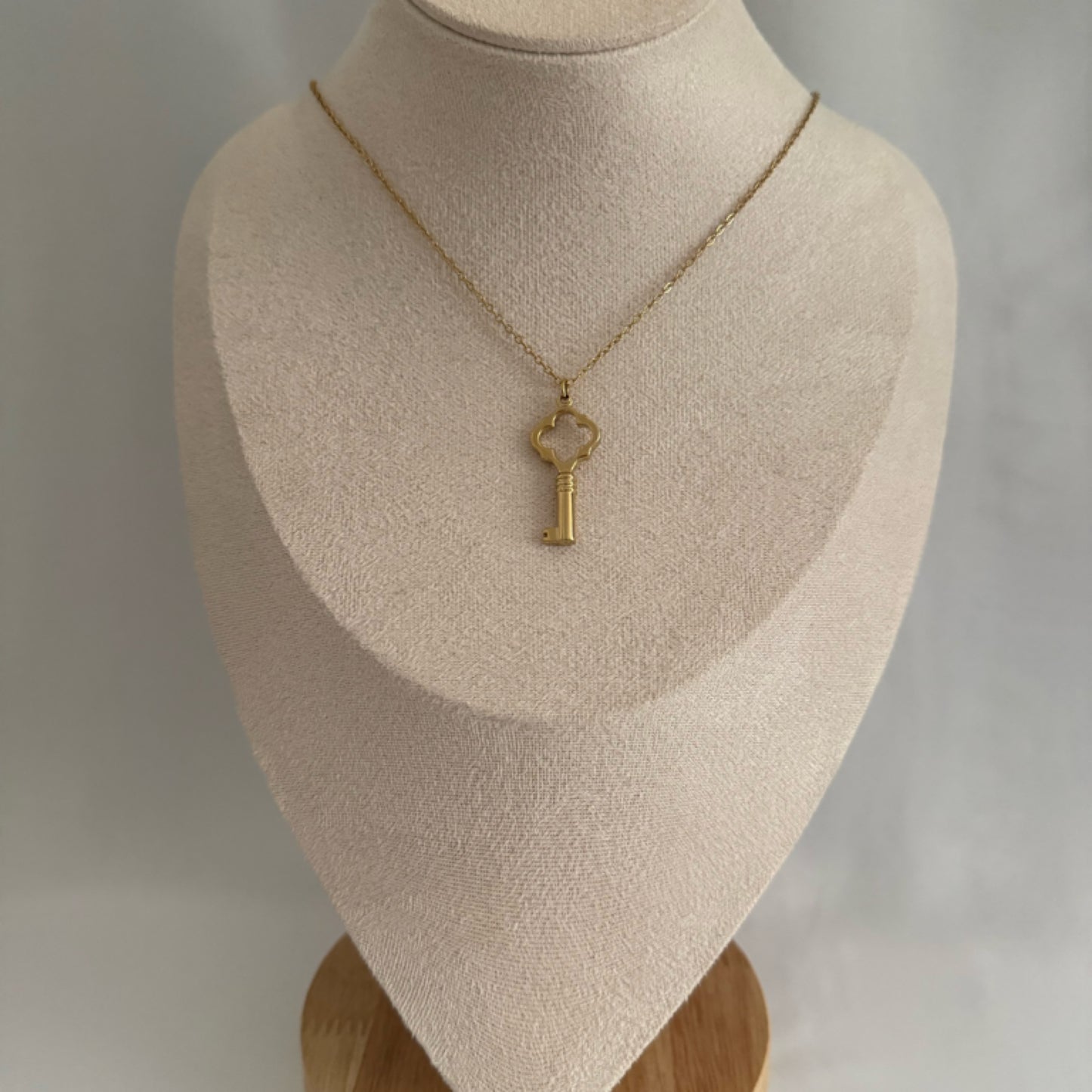 Large key charm necklace