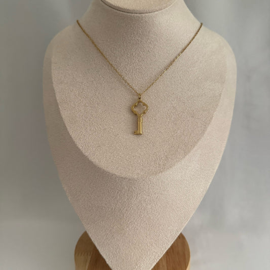Large key charm necklace