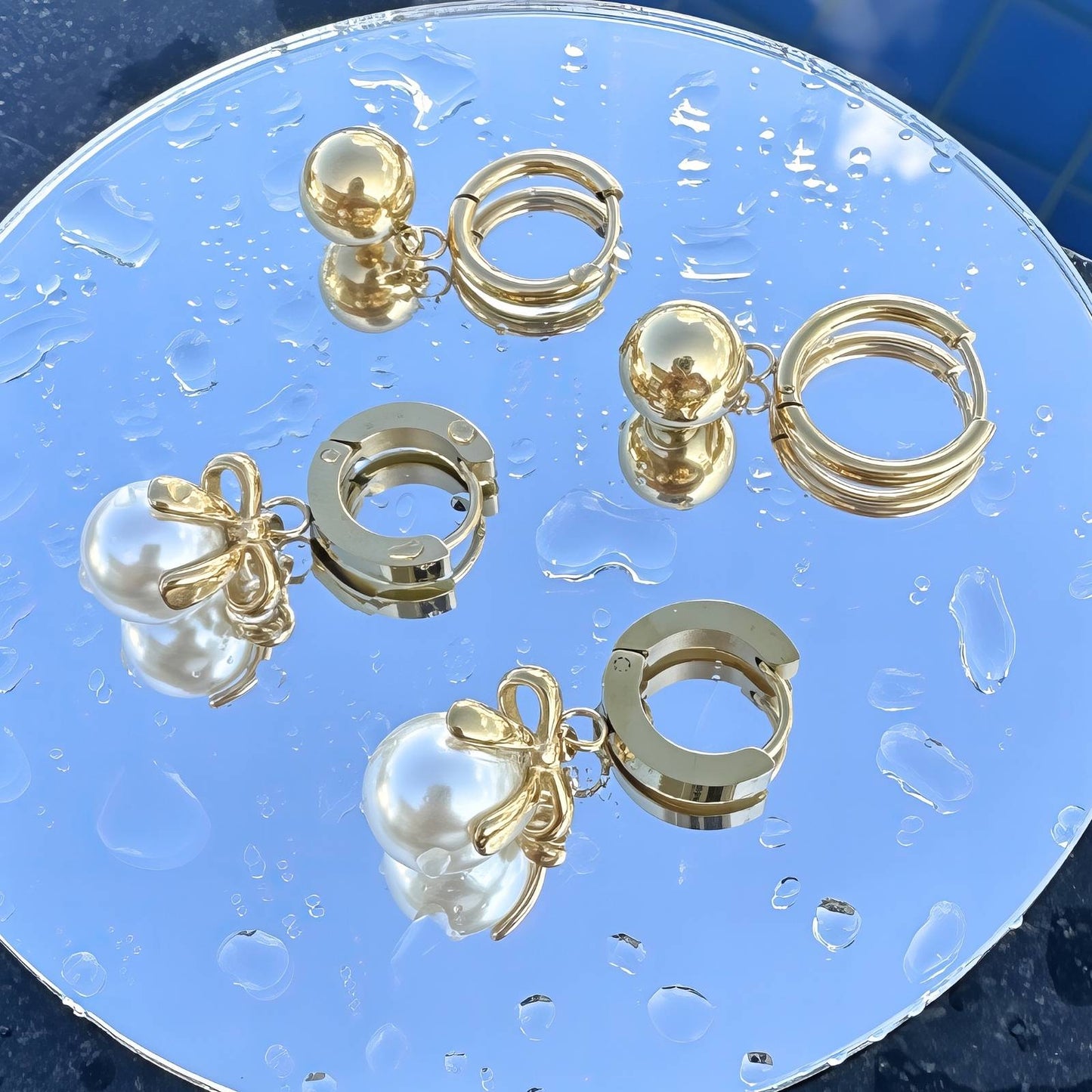 Pearl bow drop earrings