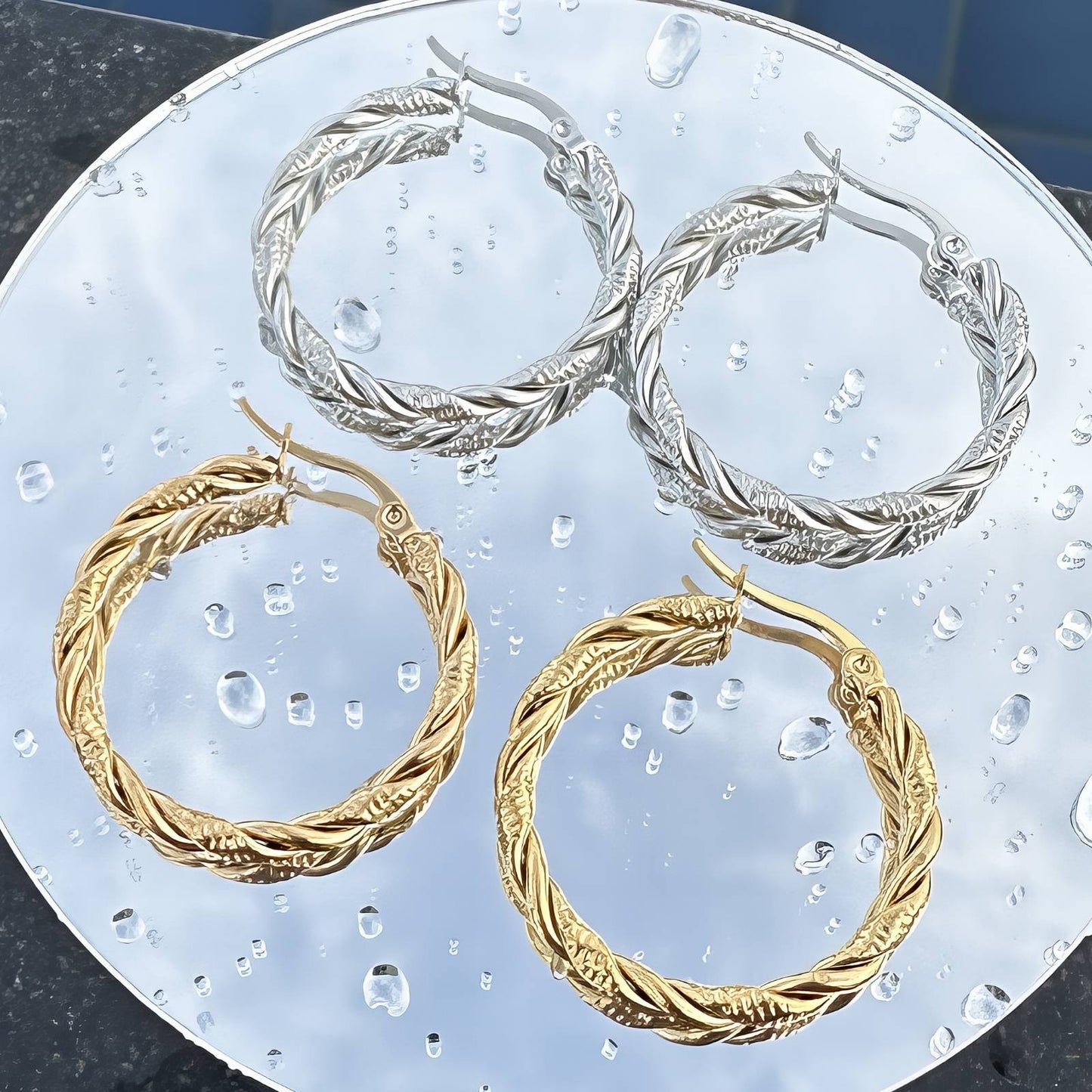Twisted hoop earrings-Gold