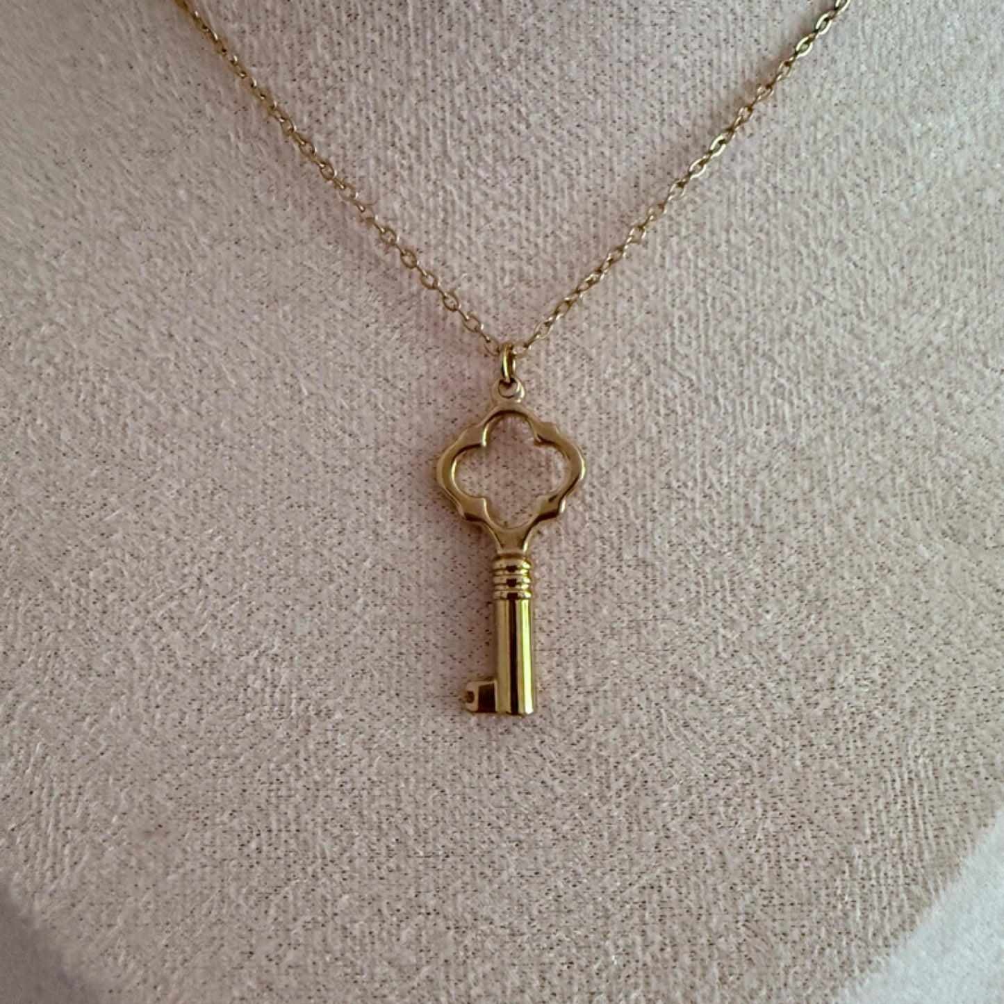 Large key charm necklace