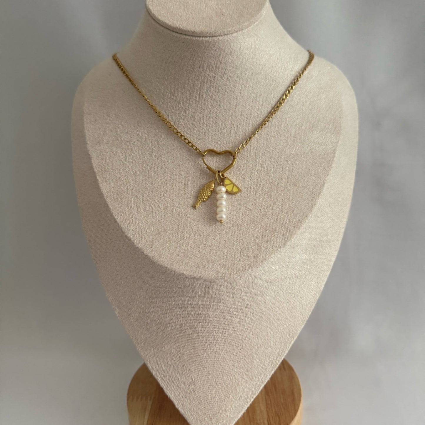 Pearl drop charm necklace