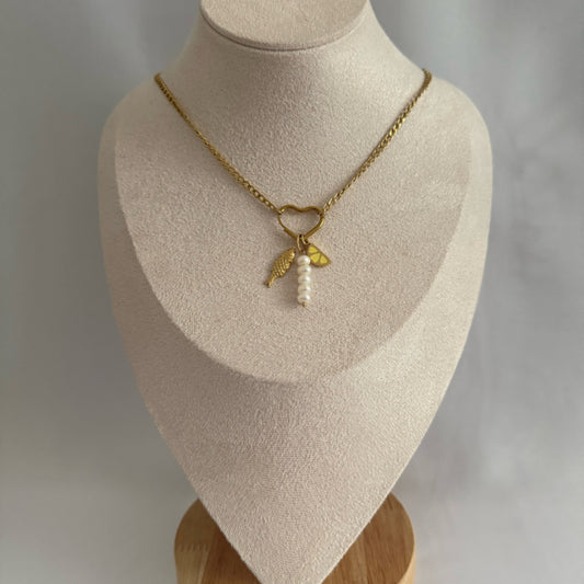 Pearl drop charm necklace