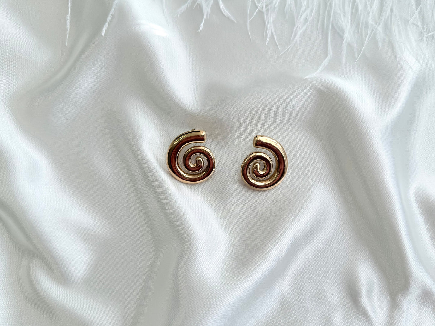 Spiral statement stud earrings Gold