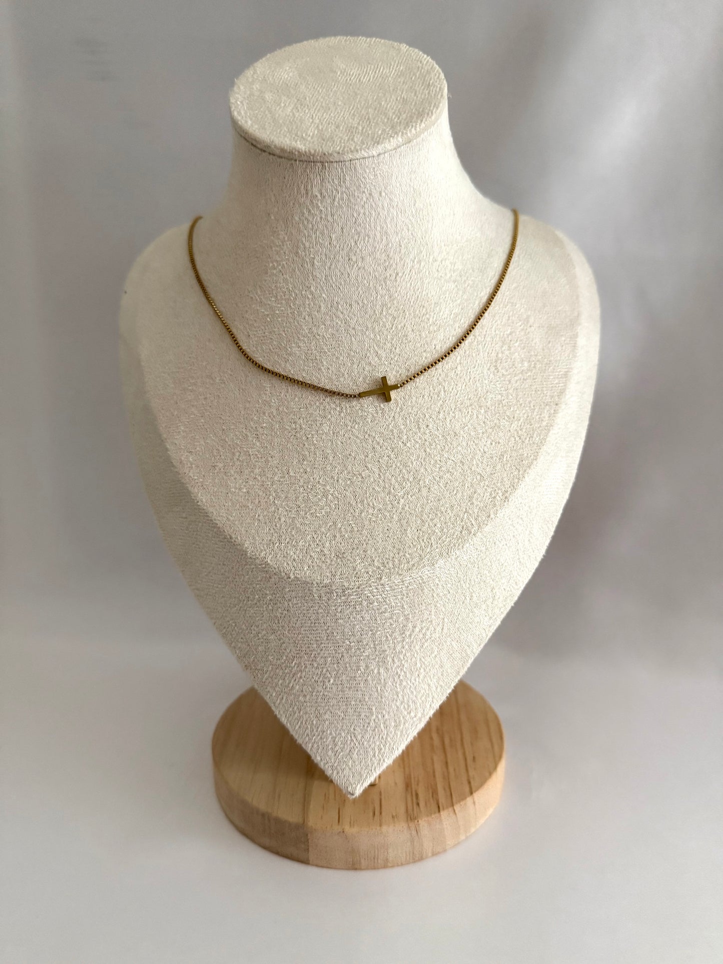 Sideways cross necklace