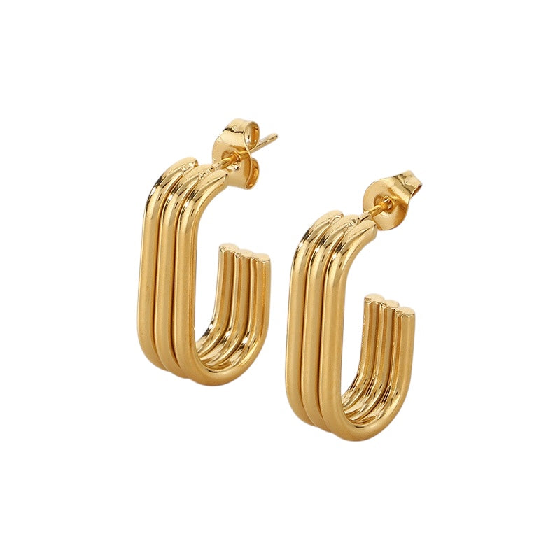 Ribbed u shaped earrings gold
