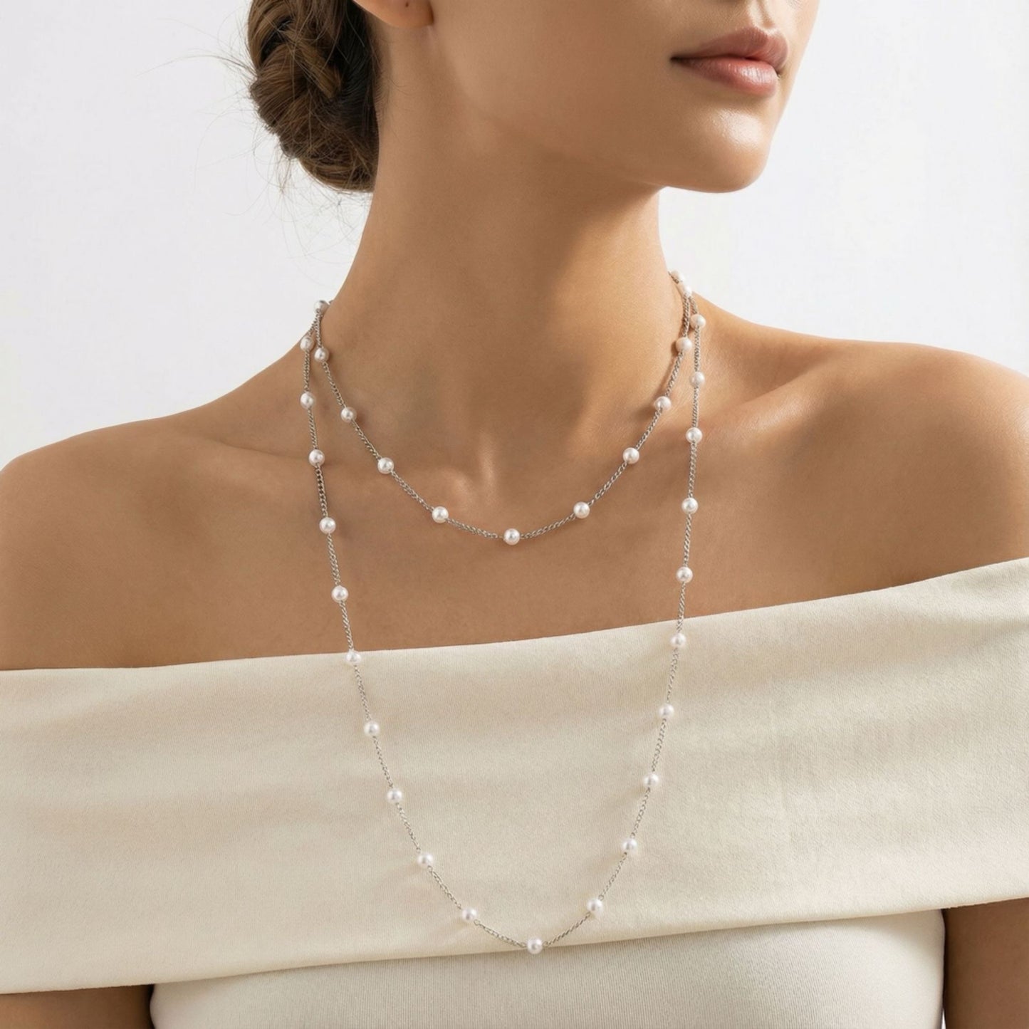 Double length spaced pearl necklace silver